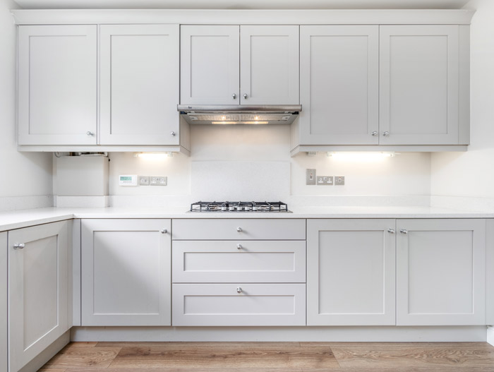 Clean white kitchen cabinets
