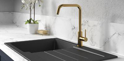 Kitchen sinks and taps on display in our Surrey showroom