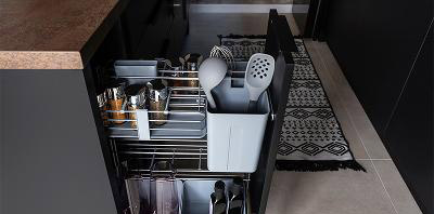 Kitchen storage solutions including pull-out pantry and carousel