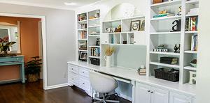 A fitted office with a bookcase