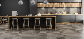 A modern kitchen with tile flooring