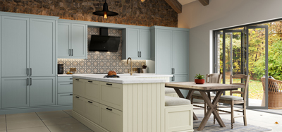A traditional kitchen with exposed brick walls