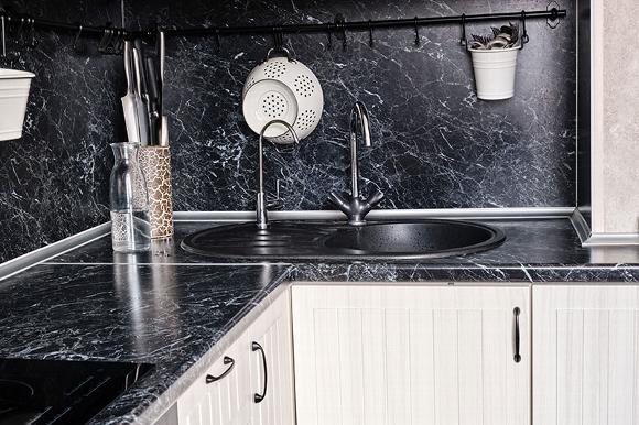 dark granite worktop in kitchen