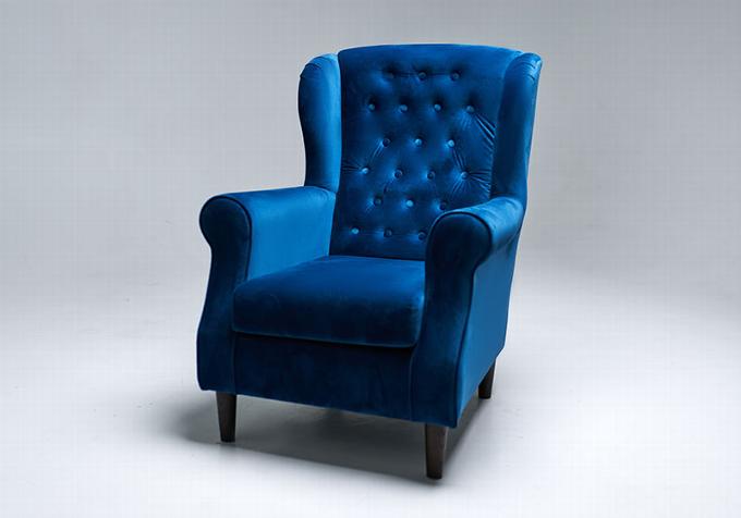 Blue velvet upholstered chair