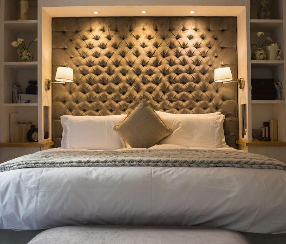 Custom built in headboard with shelves